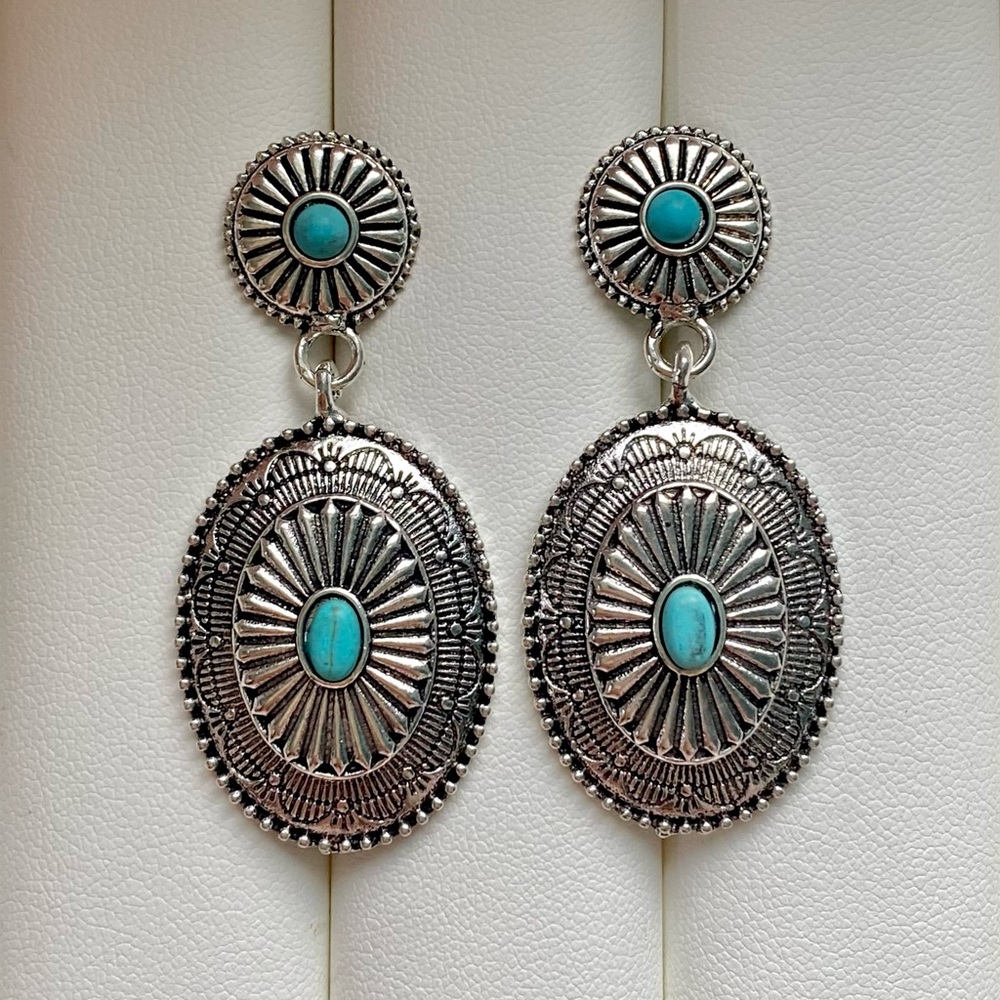 Silver and turquoise earrings with a southwestern vibe